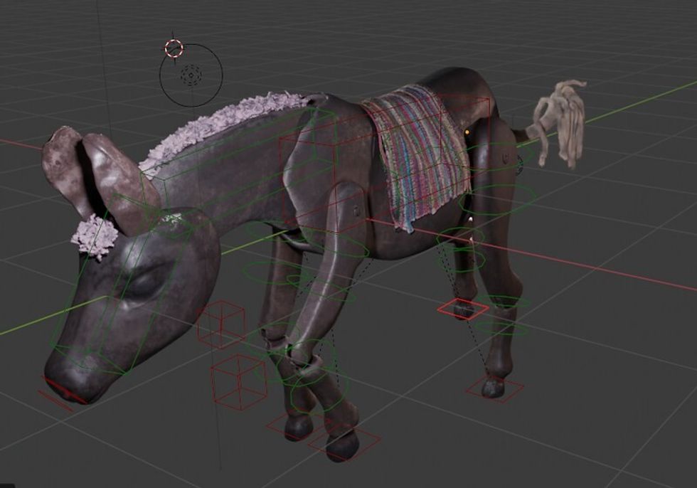 3D model of a horse with a colorful cloth, shown with rigging lines.