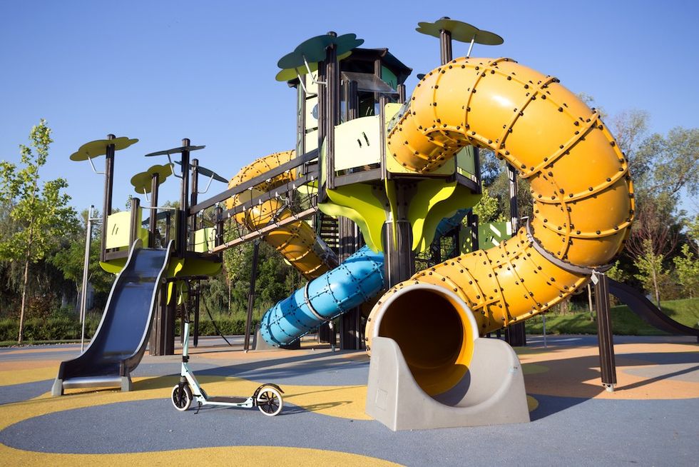 A large beautiful playground in the park. urbanization of cities