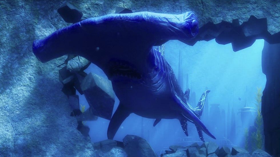 A purple hammerhead shark swimming through a shattered underwater wall.