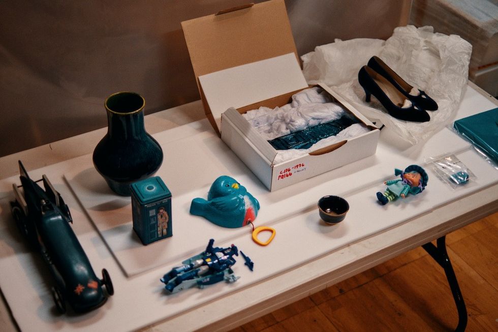 A selection of blue objects – ranging from an 8th Century Chinese Cup to a BBC Enterprises TARDIS biscuit tin from the 1980s. Being packed ready to move into Young V&A’s Play Gallery.