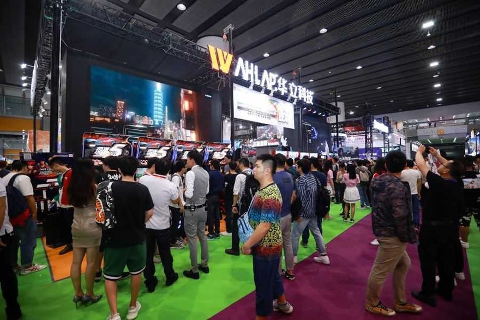 AAA 2019 Attendees outside Wahlap booth