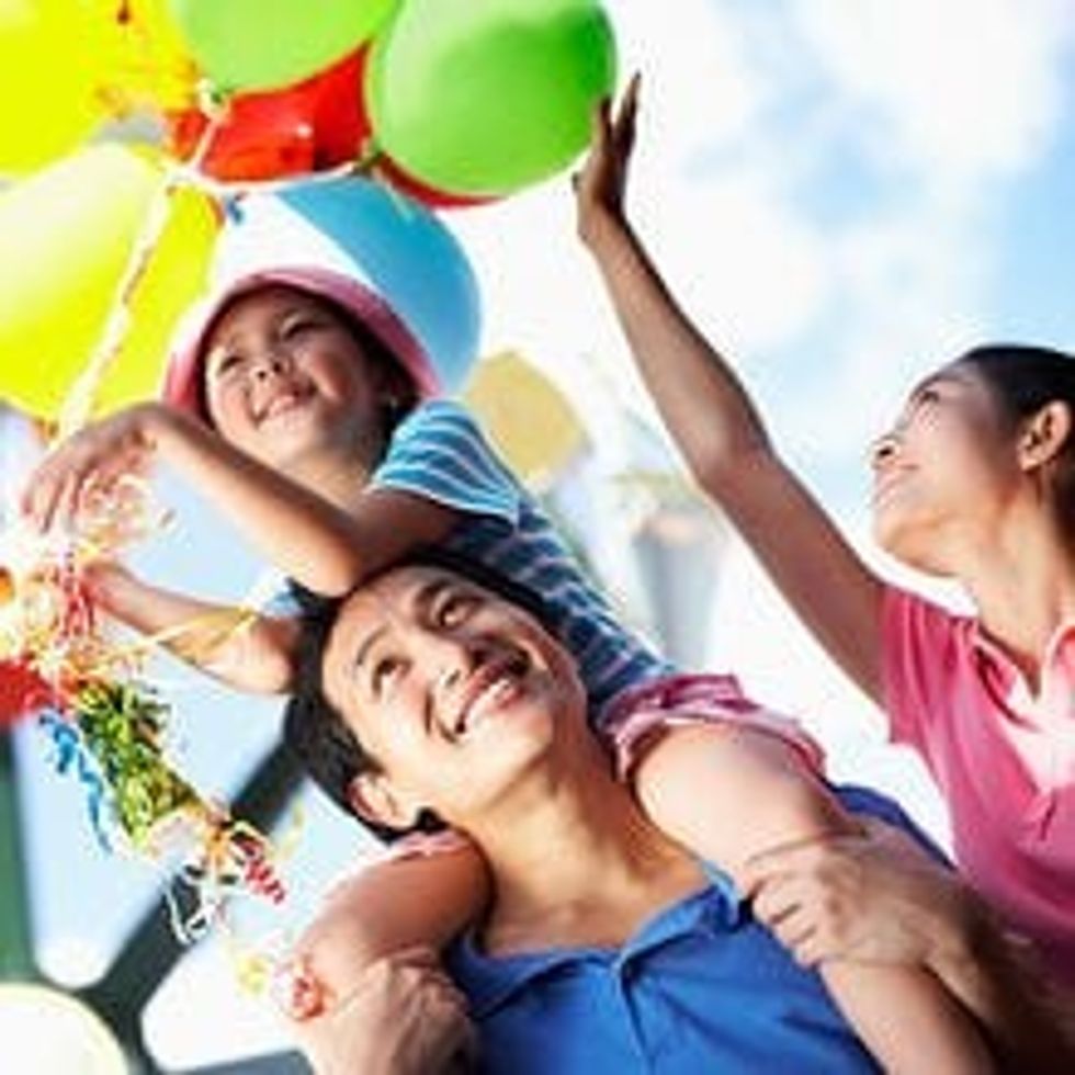 accesso, family of three enjoying themselves with balloons