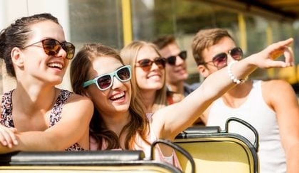 accesso tours and attractions, people with sunglasses on a vehicle