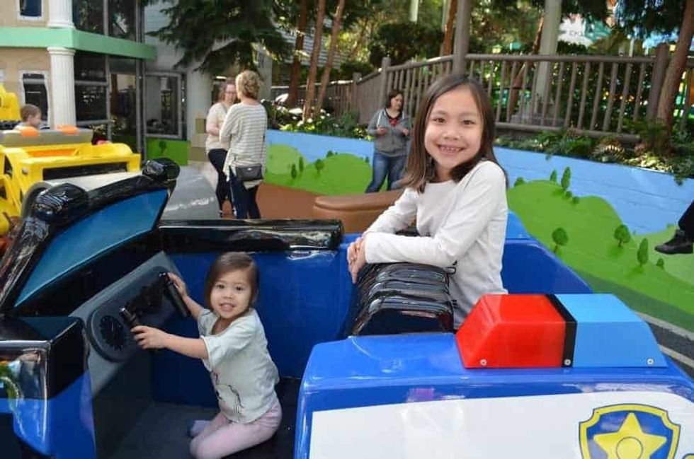 Adam Sandy's children on the Paw Patrol Playground at Nick Universe theme park guest expectations