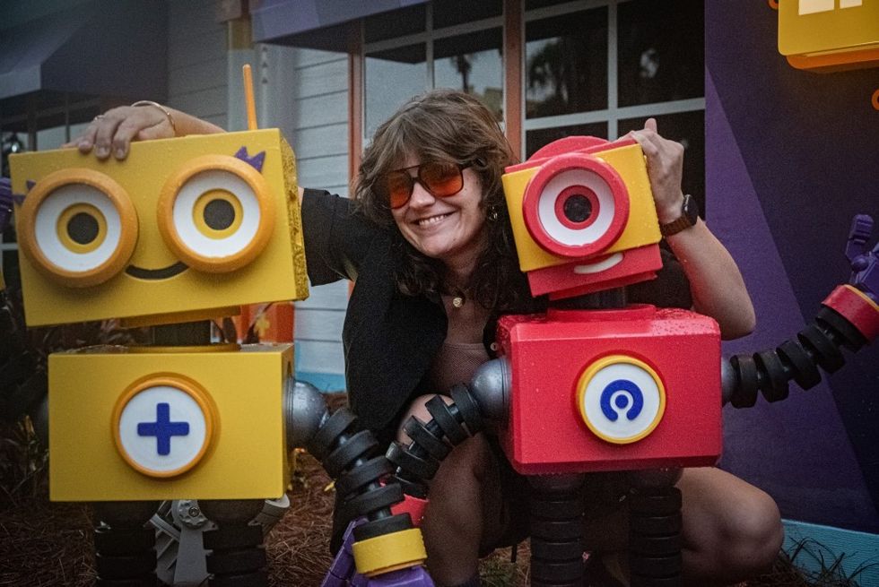 Adirondack Studios community projects Give Kids the World Village ADKS Carpenter Abigail Cox with Wonderbots