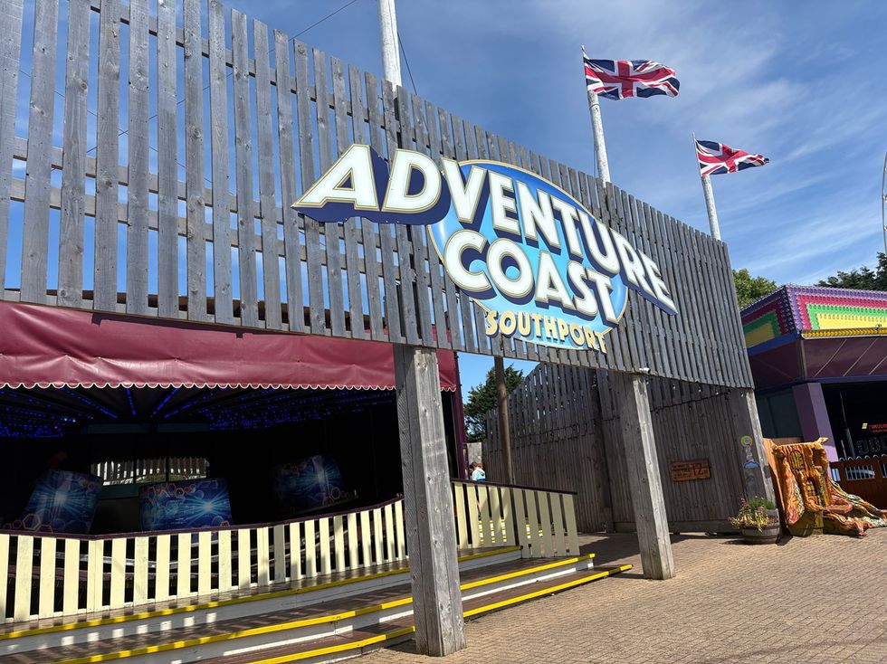 Adventure Coast Southport entrance with Union Jack flags flying above.
