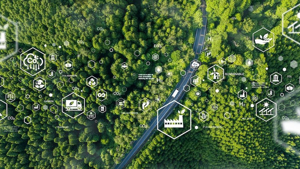 Aerial view of car in green forest with icons representing eco-friendly transport. Clean and greenhouse-free green transport concept in electric drive mode.