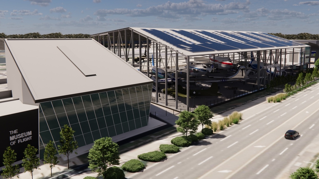 Aerial view of The Museum of Flight with aircrafts displayed under a large canopy.