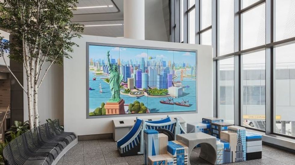 Airport lounge with cityscape play area for children from \u200bBreeze Creative