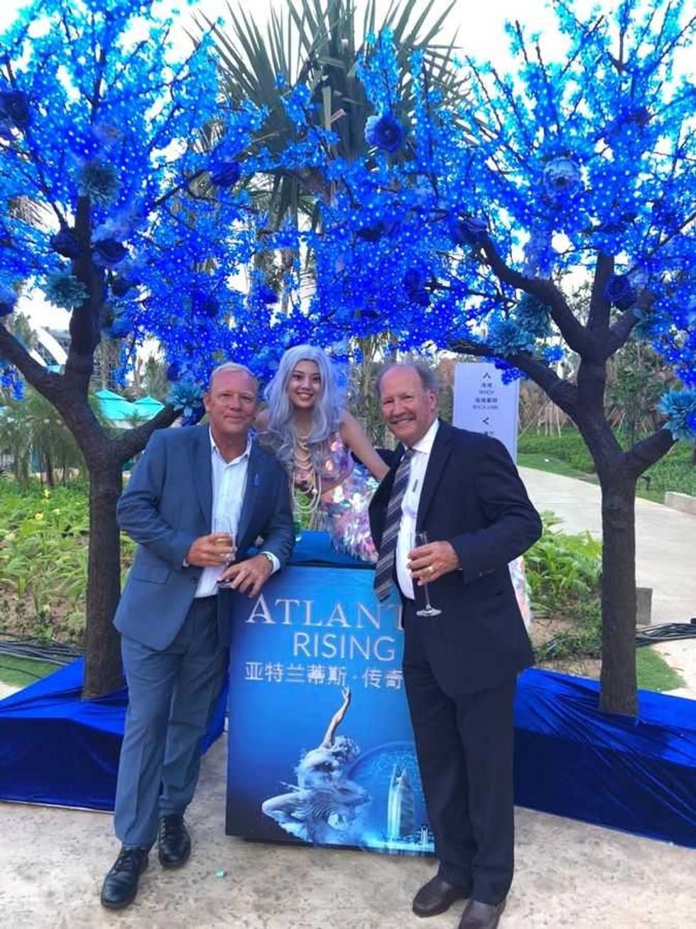 Alan Mahony (left) with ProSlide's Rick Hunter and mermaid friend at Atlantis Sanya