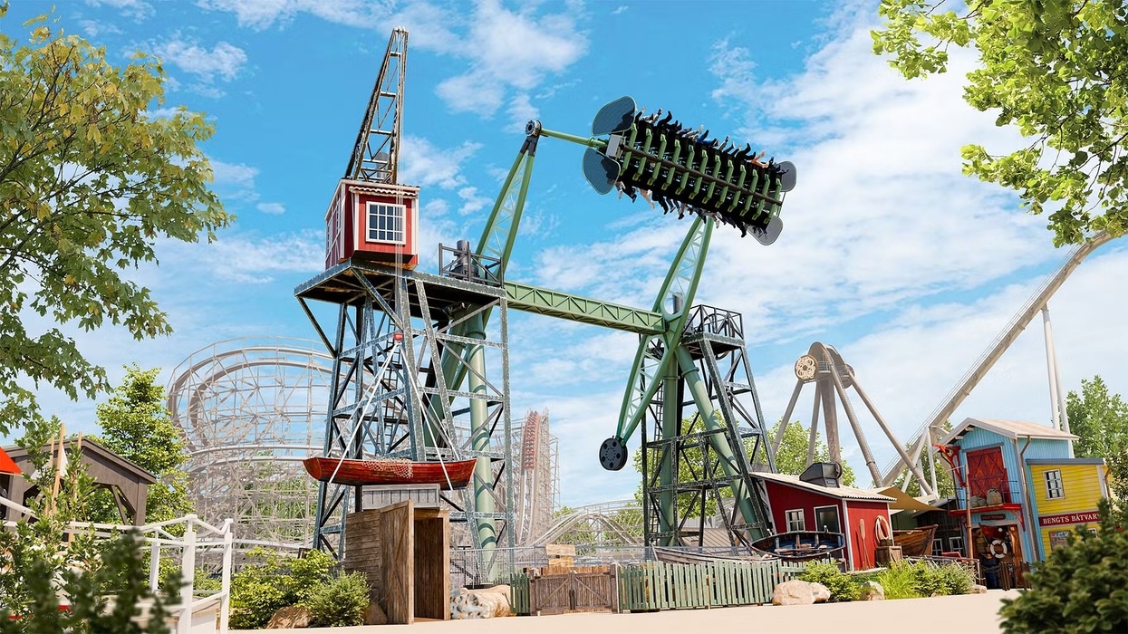 Amusement park ride, Stormvåg at Liseberg, flipping riders upside down on a sunny day.