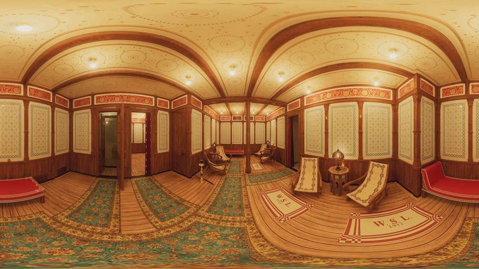 An opulant Temperare Chamber with loungers and an opulant ceiling