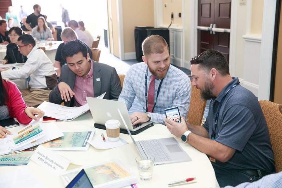 attendees at iaapa fec summit 2018 sharing ideas