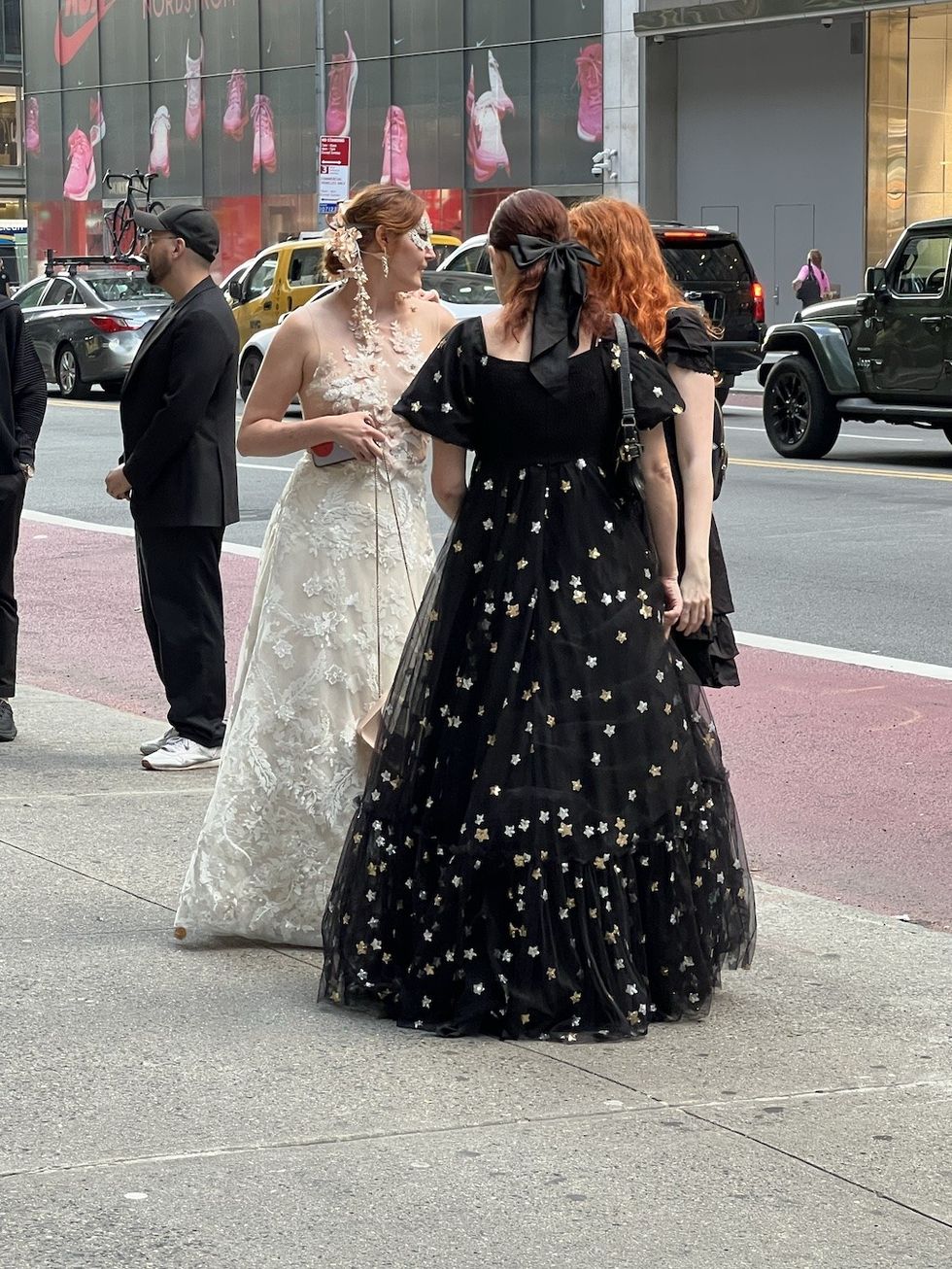 audience members dress up for Masquerade