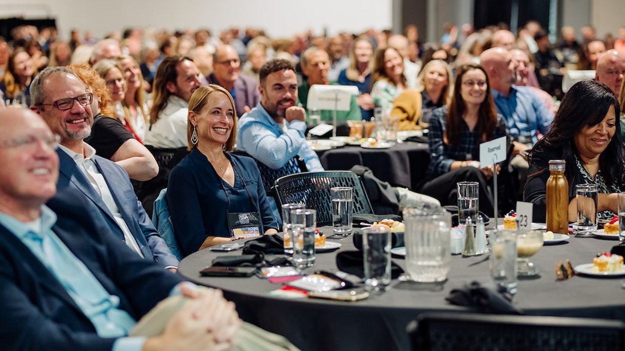 Audience of people smiling and engaged at AZA Annual Conference