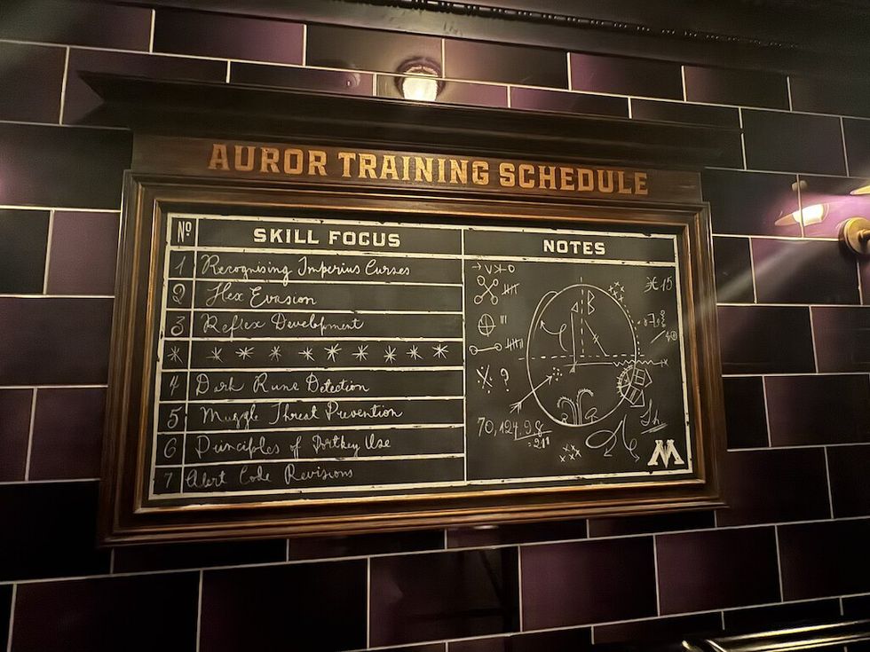Auror training in queue line for Harry Potter and the Battle at the Ministry Wizarding World of Harry Potter Ministry of Magic Universal Epic Universe