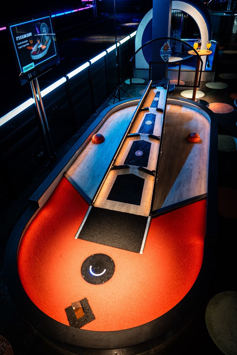 Basketball themed mini golf hole from 360Golf, with glowing accents.