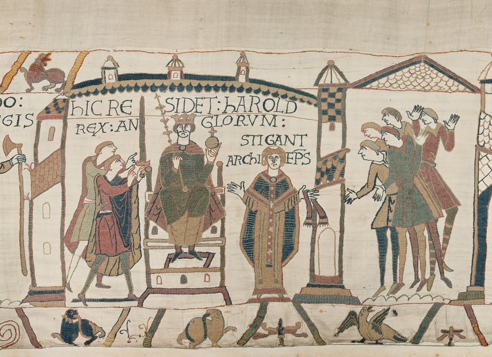 Bayeux Tapestry depicting a king seated on a throne, surrounded by attendants.