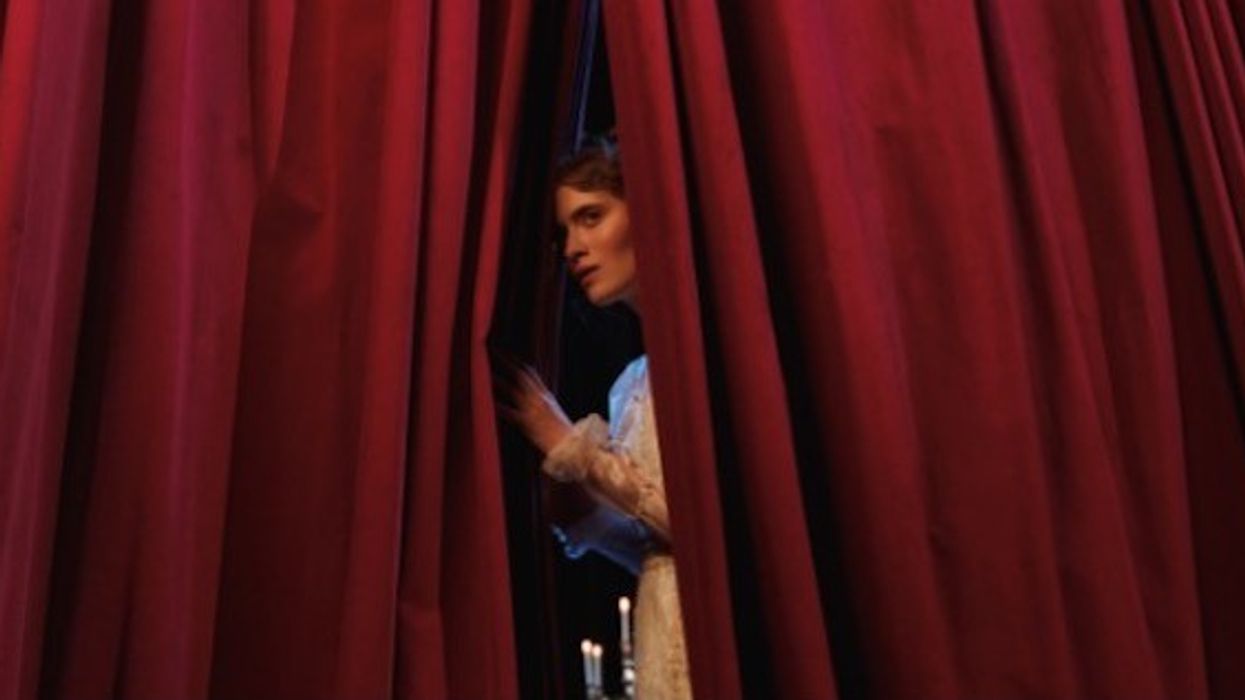 Behind the curtain