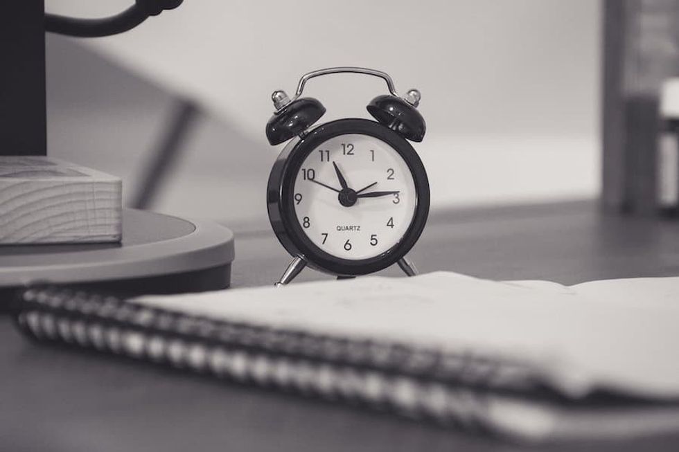 black and white clock deadlines