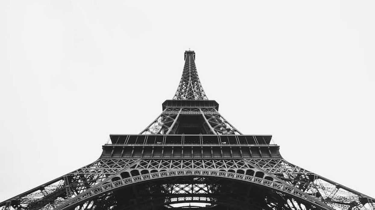 black and white shot of Paris's Eiffel Tower from below Vivaticket