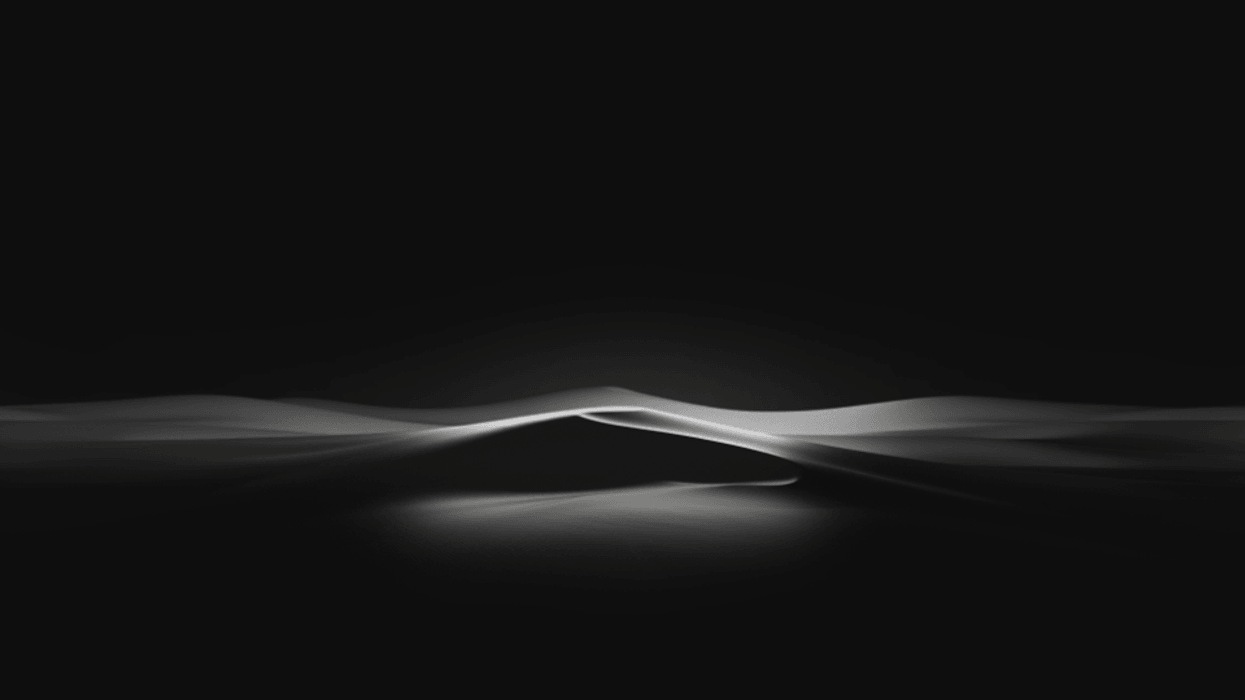 Black background with silver graphic smokey effect layered on top