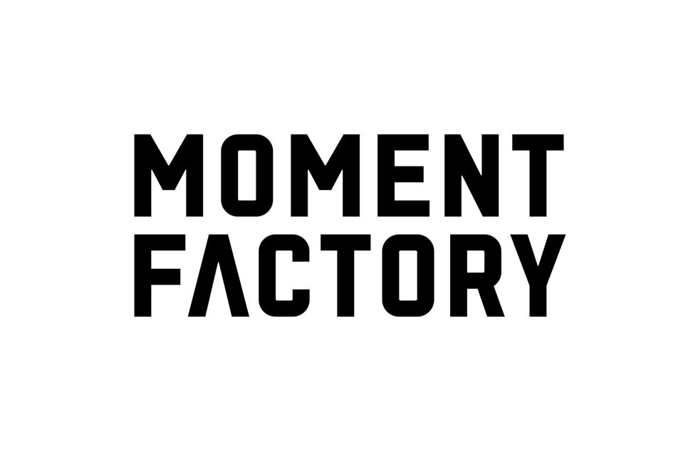 Black "Moment Factory" text on a white background.