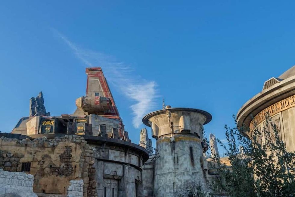 black spire outpost village blue sky star wars galaxys edge