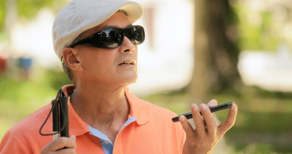 Blind-person-using-mobile-phone