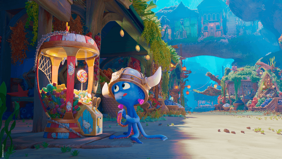 Blue creature, Snorri, examines candy machine in a vibrant, colorfulunderwater market scene.
