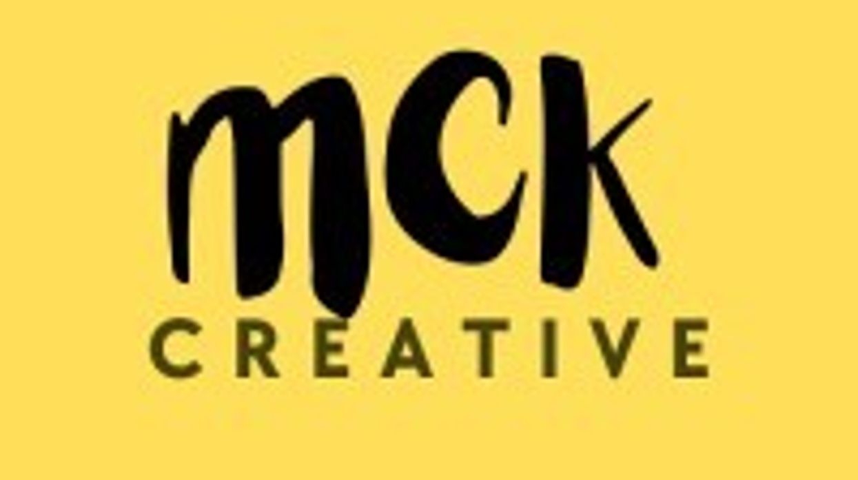 "Bold 'mck creative' logo on a yellow background."