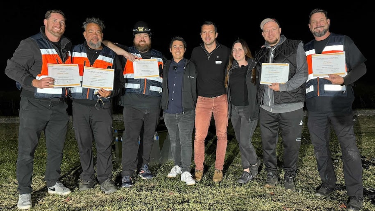 CEO Laurent Perchais in the center, accompanied by Nicole Abbett, US Project Manager, and François Nouchet, Team Leader, celebrating with a newly certified US pilot team!
