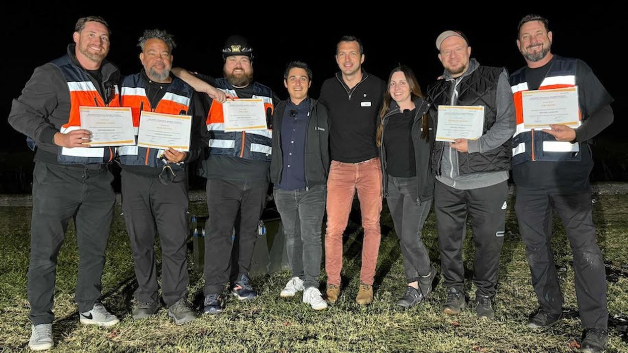 CEO Laurent Perchais in the center, accompanied by Nicole Abbett, US Project Manager, and François Nouchet, Team Leader, celebrating with a newly certified US pilot team!