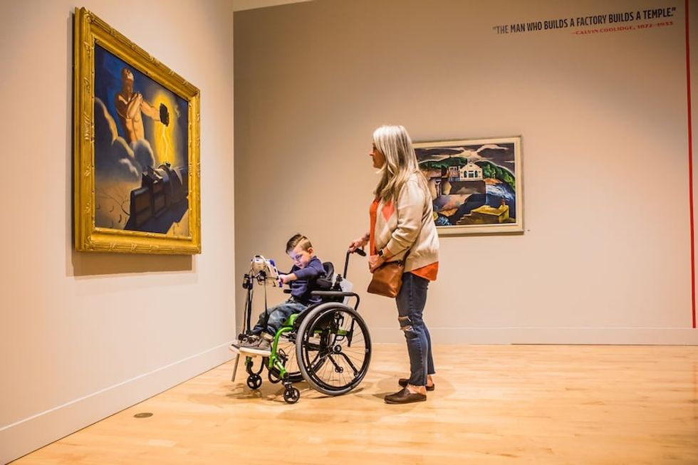 child in wheelchair at Philbrook