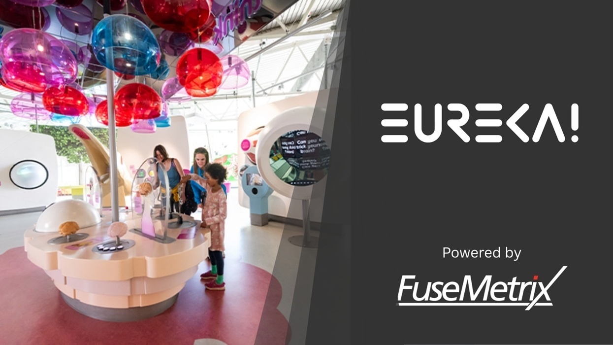 Children exploring a colorful science exhibit at Eureka!, powered by FuseMetrix.