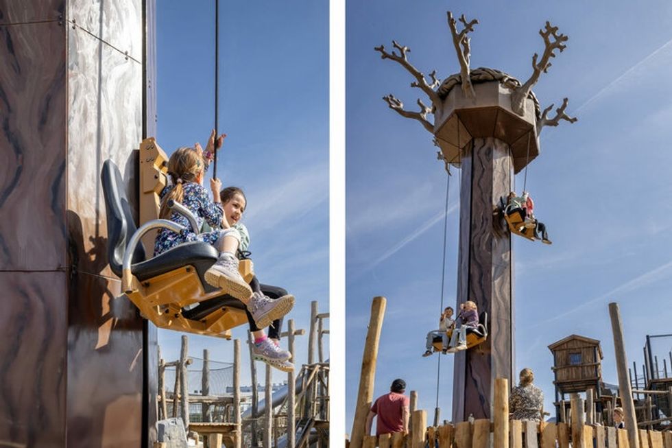 Children joyfully ride a tree-themed amusement park drop tower from Sunkid