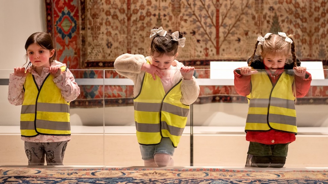 Children marvelling at The Wagner Garden Carpet
