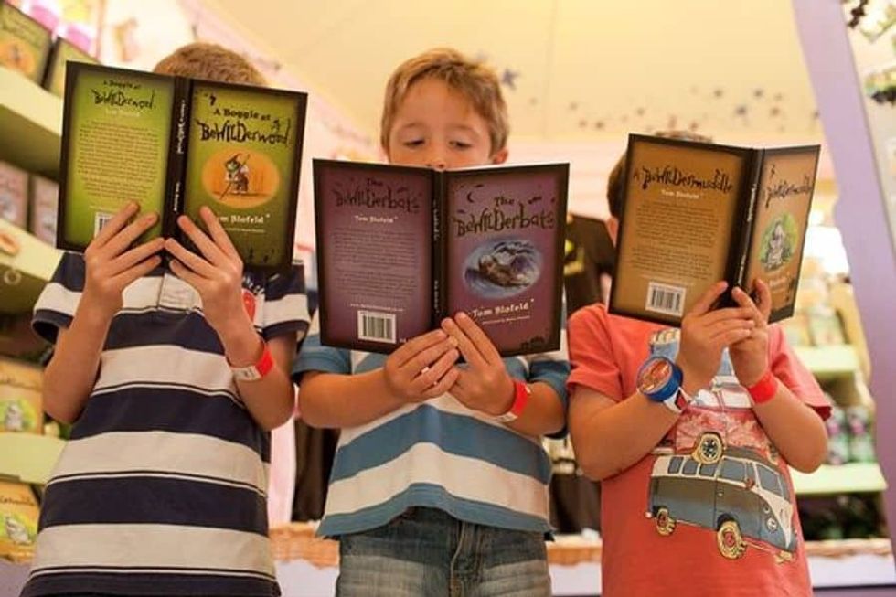 Children reading the BeWILDerwood books