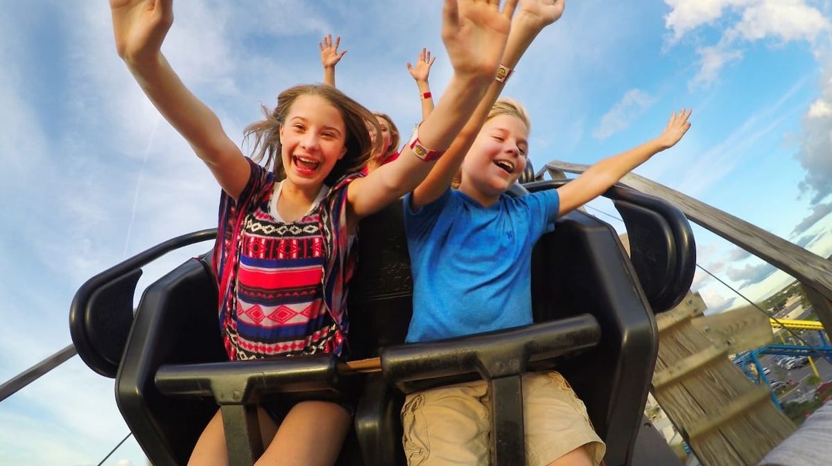 children ride rollercoaster at fun spot america