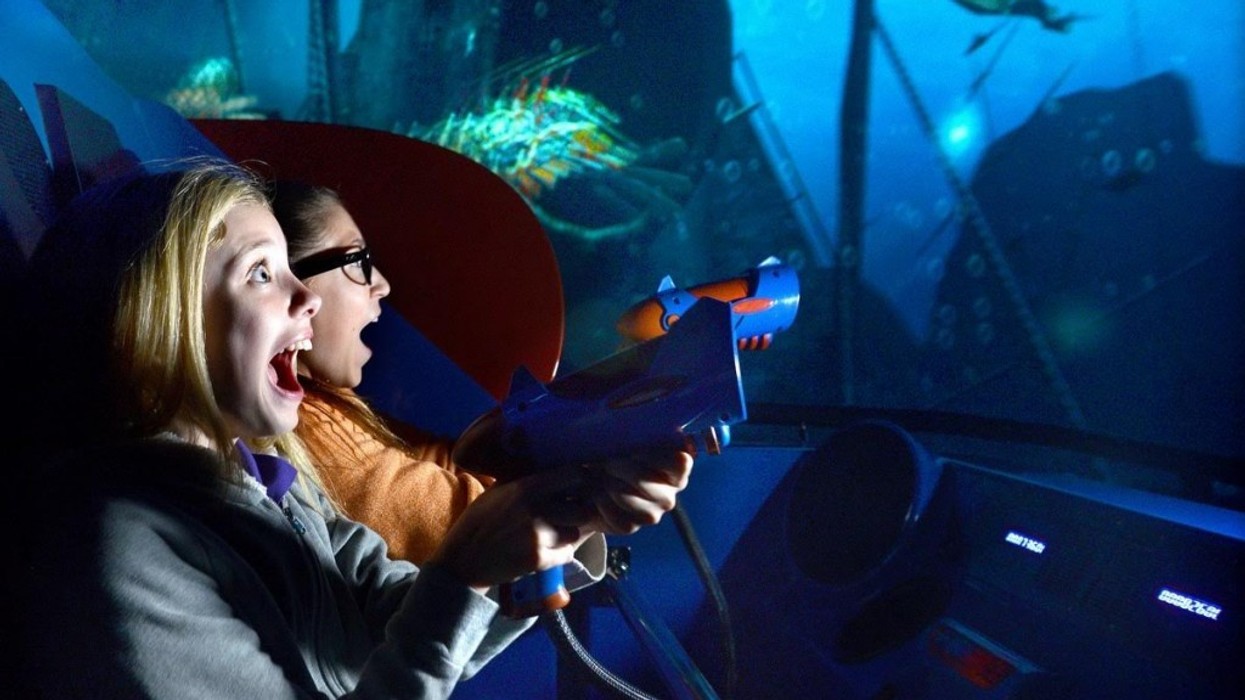 children-shooting-guns-in-a-dark-ride-by-triotech