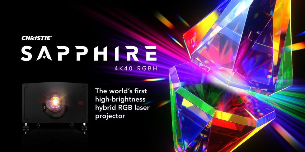 Christie Sapphire 4K40-RGBH laser projector with colorful crystal graphic and light beams.