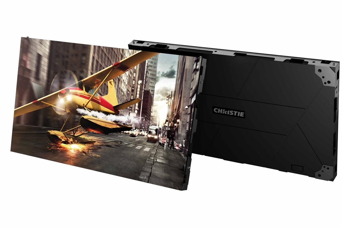 Christie XP Series LED display showing a plane landing on a city street, sparks flying at the point of contact.