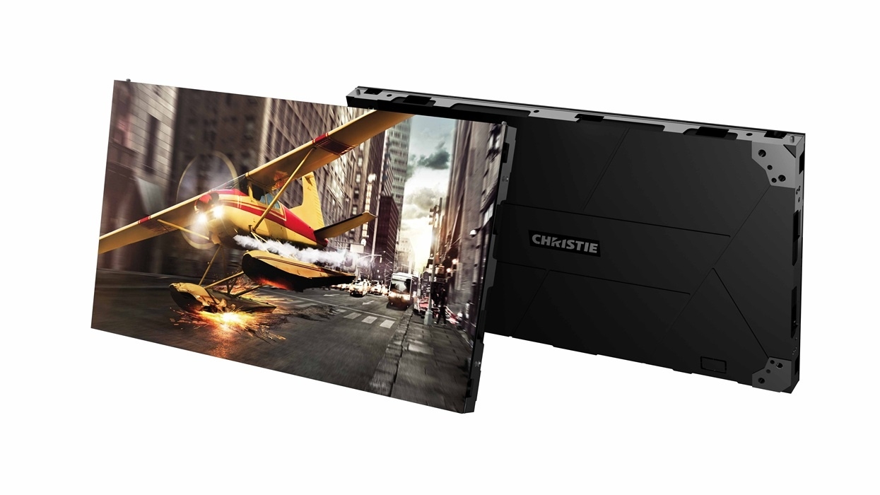 Christie XP Series LED display showing a plane landing on a city street, sparks flying at the point of contact.