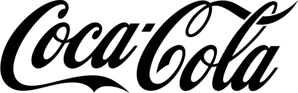 Coca-Cola logo in classic script font, black text on white background.