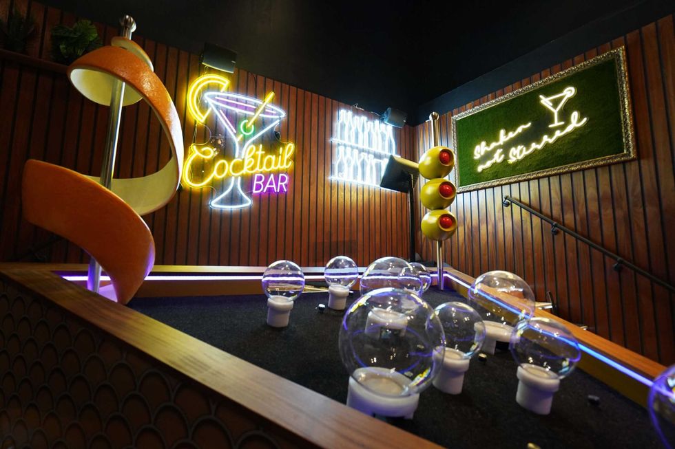 Cocktail bar design mini golf hole Albatross