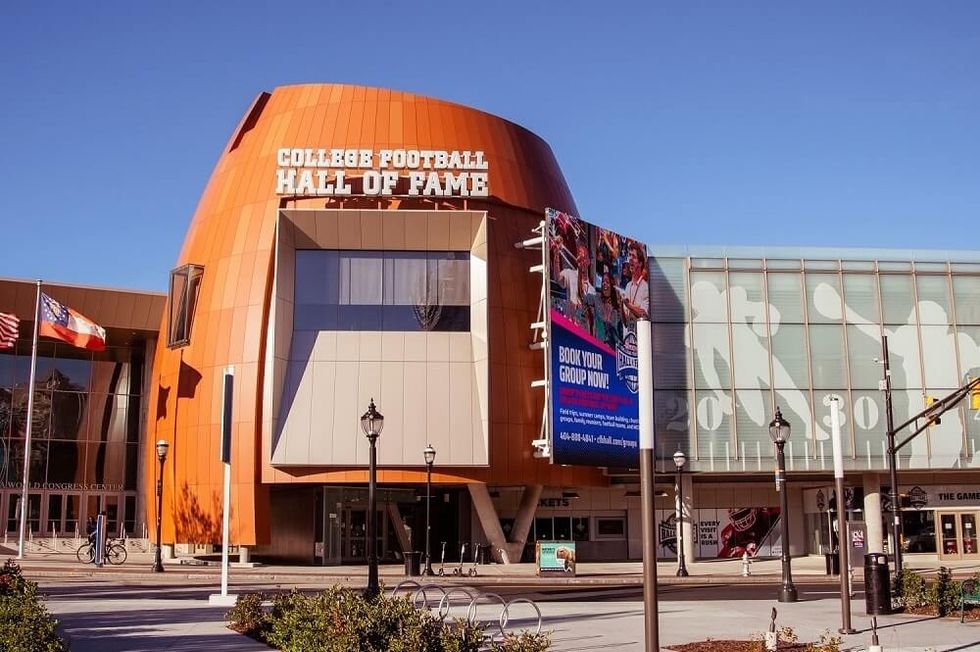 College Football Hall of Fame building with modern design and sunny sky.