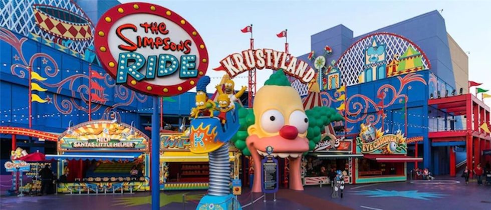 Colorful amusement park entrance themed after "The Simpsons" cartoon series.