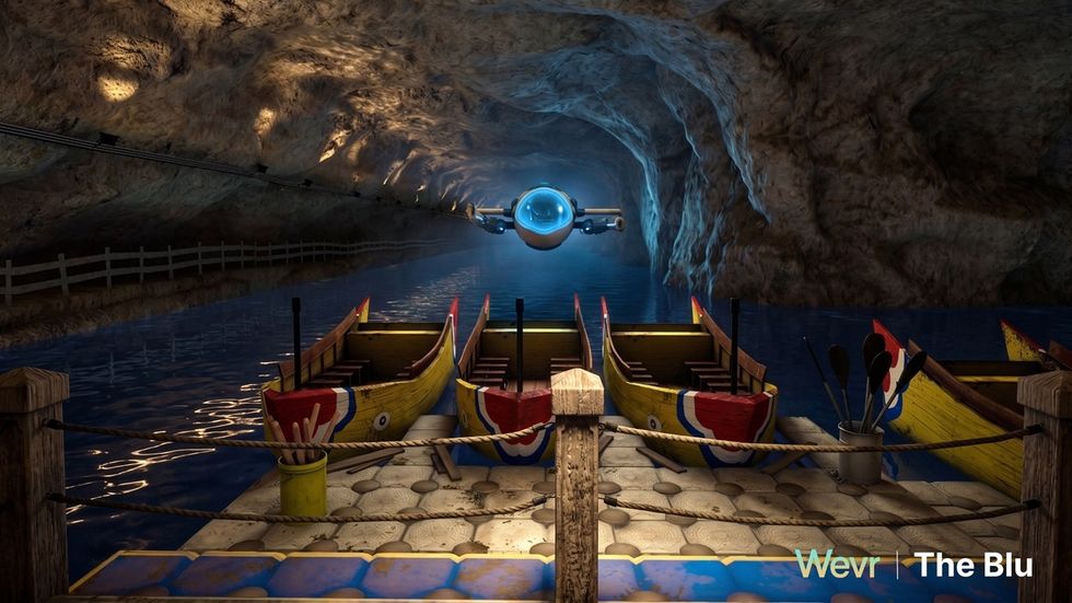 Colorful boats docked in a cave with a futuristic watercraft approaching in The Blu: Expedition Taiwan