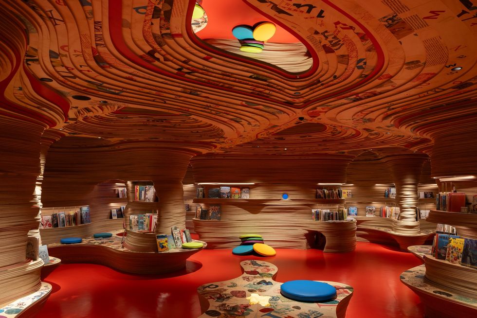 Colorful, futuristic library at Mona with organic shapes and vibrant seating.