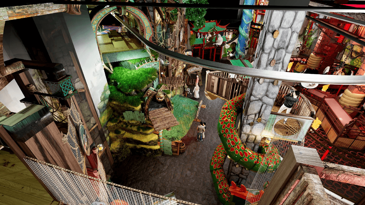 Colorful indoor playground with bridges, slides, and lush, themed decorations.